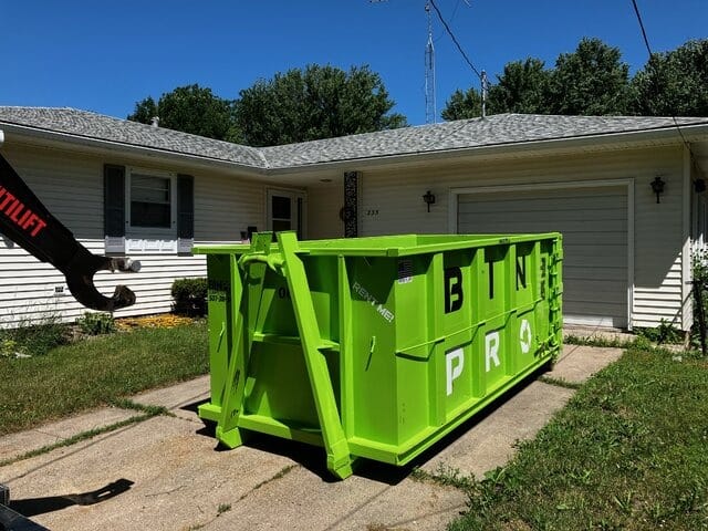 Bin Pro Dumpster in driveway of home.