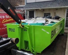 Dumpster behind home full