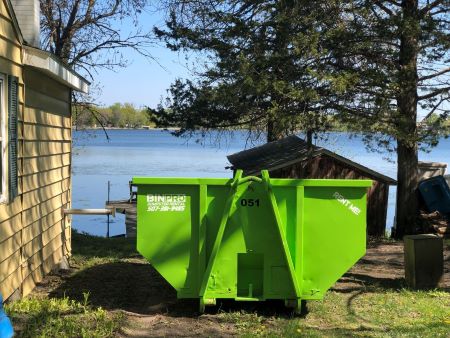 dumpster by lake